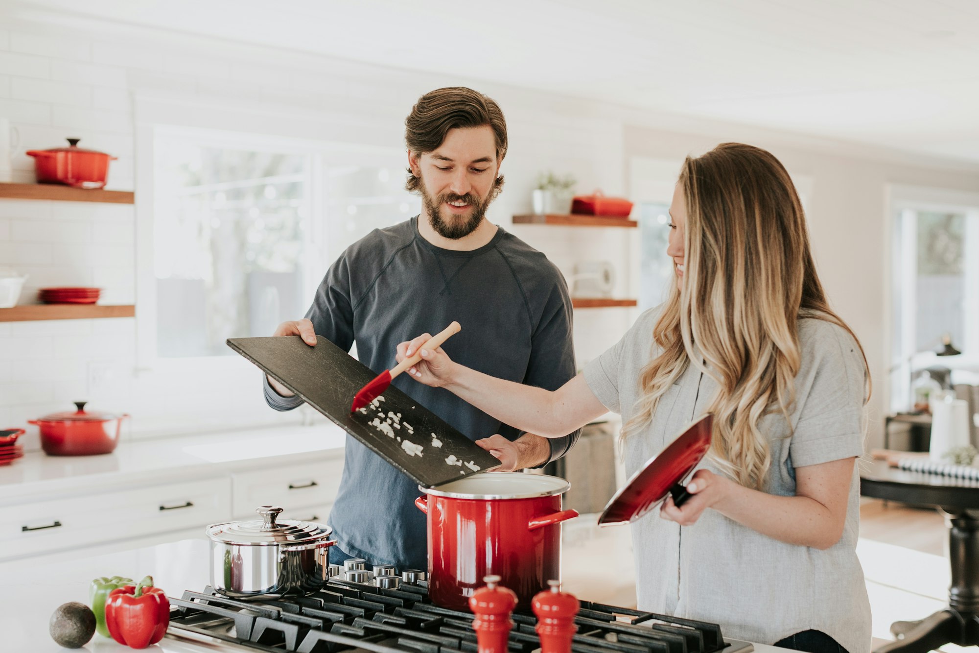 Real estate agent meeting with vendors at the kitchen table