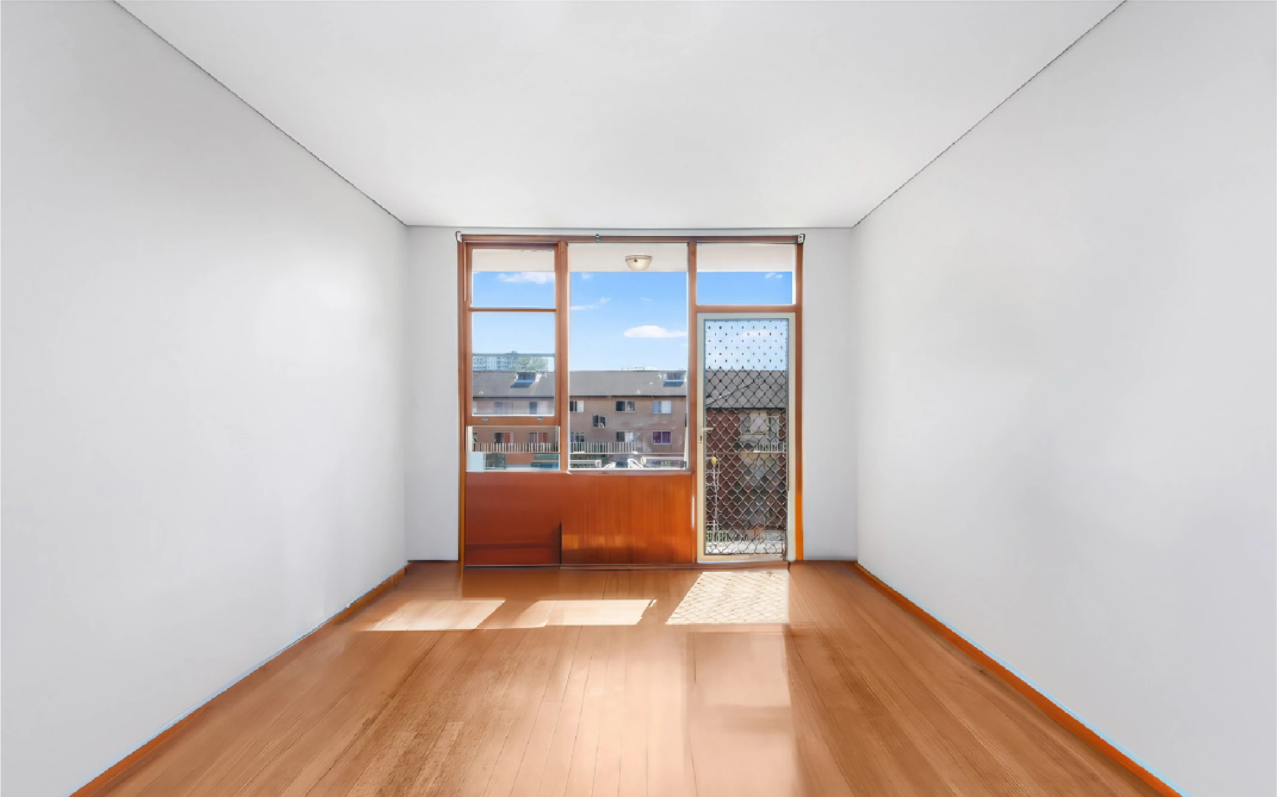 Empty living room — before